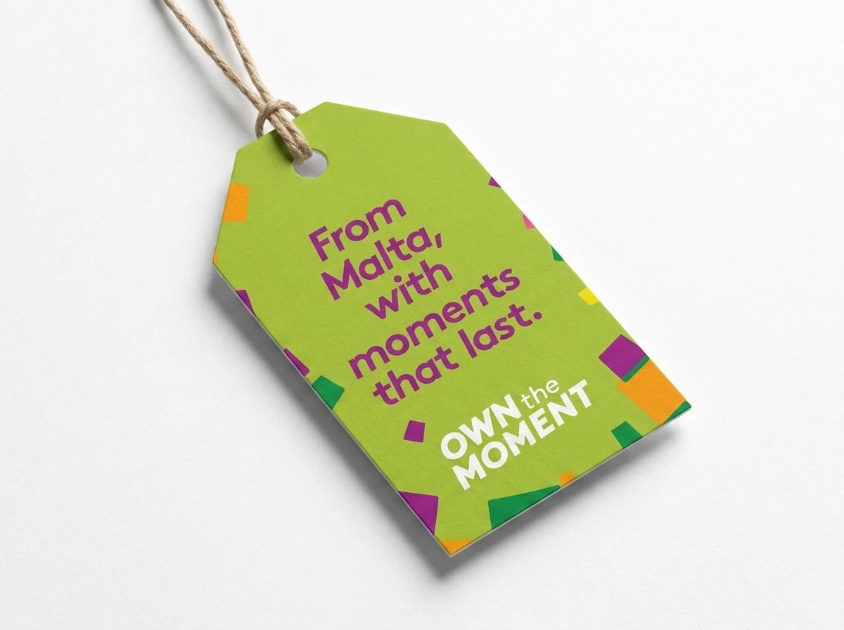 Own The Moment, Malta 2025: tag “From Malta, with moments that last.” com a identidade do evento