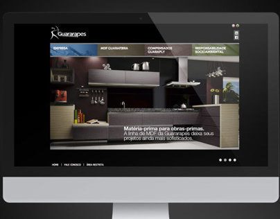 Guararapes: site em um monitor, mostrando uma cozinha com móveis de MDF